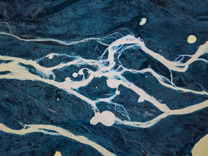 Flow of water on the ground. Aerial view.
